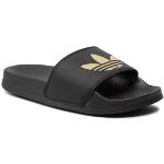 Dámske Kožené šľapky adidas Adilette čiernej farby z koženky vo veľkosti 37 na leto 