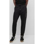 Pánske Designer Športové nohavice HUGO BOSS BOSS čiernej farby regular z bavlny v zľave 