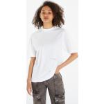 Dámske Designer Tričká s krátkym rukávom Calvin Klein Jeans bielej farby s kvetinovým vzorom vo veľkosti XS v zľave 