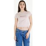 Dámske Designer Tričká s krátkym rukávom Calvin Klein Jeans ružovej farby s kvetinovým vzorom vo veľkosti XS v zľave 