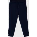 Chlapčenské Detské nohavice Guess tmavo modrej farby s jednofarebným vzorom z bavlny do 24 mesiacov 