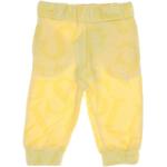 Detské tepláky Guess žltej farby v športovom štýle 