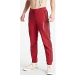 Pánske Elastické nohavice Jordan červenej farby z flisu vo veľkosti XS na zips 