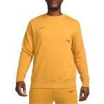 Jesenná móda Nike Sportswear žltej farby s motívom Paris Saint-Germain na zimu 