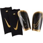 Chrániče holení Nike Mercurial X zlatej farby v zľave 