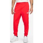 Športové nohavice Nike Sportswear červenej farby v ležérnom štýle zúžené v zľave 