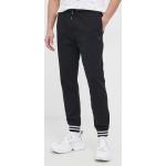 Pánske Športové nohavice Guess čiernej farby s jednofarebným vzorom z bavlny 
