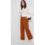 Dámske Športové nohavice LEVI´S hnedej farby s jednofarebným vzorom z bavlny vo veľkosti XS v zľave 