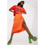Dámske Midi sukne FashionHunters oranžovej farby zo saténu s dĺžkou: Pod kolená v zľave 