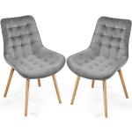 Jedálenské stoličky sivej farby s prešívaným vzorom zo zamatu 