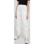 Dámske Športové nohavice G-Star Raw bielej farby s jednofarebným vzorom raw 